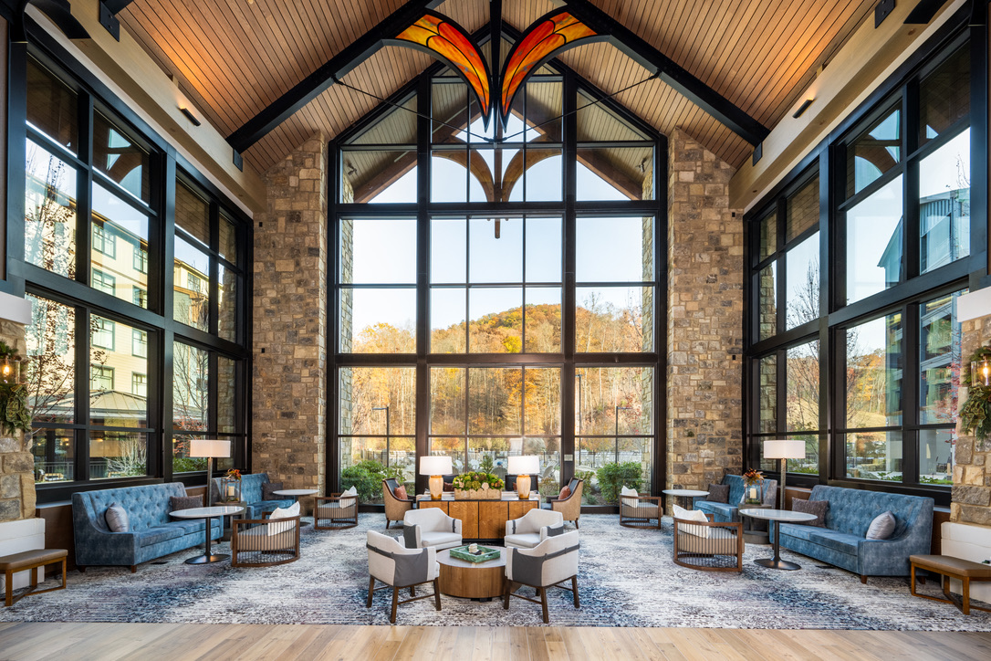 Dollywood's HeartSong Lodge and Resort lobby with its four storey stone fireplace and guitar chandelier