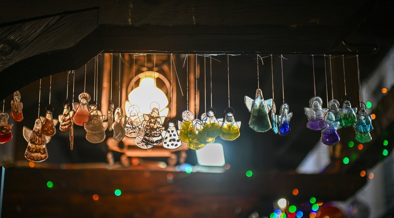 Glass Christmas ornaments hanging at a traditional Vienna Christmas market stall